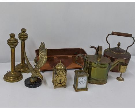 Mixed copper and brassware to include a copper and brass planter trough, copper kettle, a watering can and other itemsLocatio