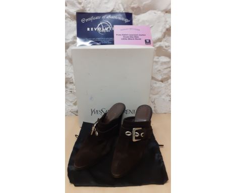 YSL- Movie Wardrobe Interest-A pair of brown light suede Yves Saint Laurent 'Moscow 90' high heel mules worn by Holly Hunter 