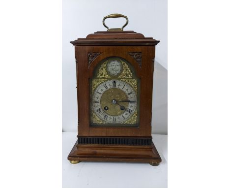 A mid 20th century mahogany 8-day Tempus Fugit mantel clock, the count-wheel strike movement signed 'Societe Clusienne' strik