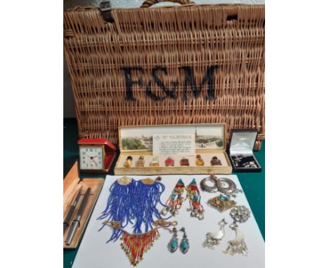 A Fortnum and Masons hamper containing mixed jewellery to include silver and turquoise earrings and a vintage box of travel '