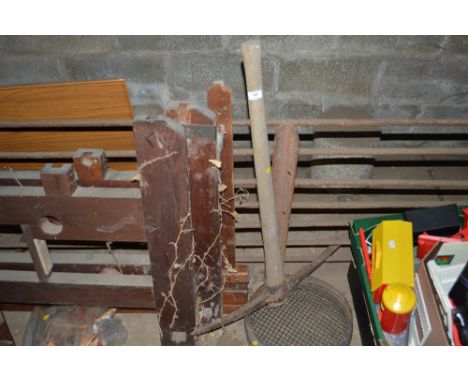 A pick axe and two sieves