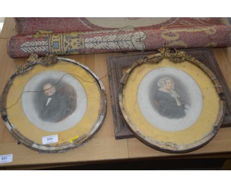 A pair of 19th Century portrait studies together with an oak frame 