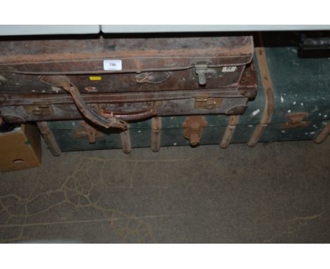 Two suitcases and a trunk 