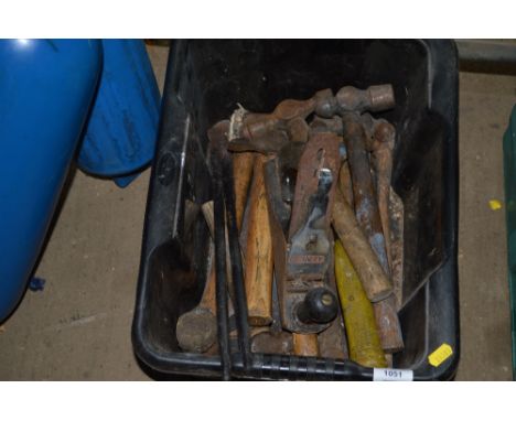A box of various hand tools