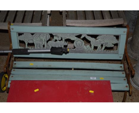 A child's wooden and metal bench 