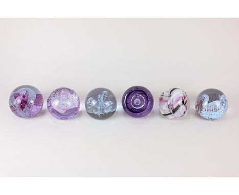 Six Caithness glass paperweights, 'Sirocco', 'Tempest', 'Vortice', 'Ribbons', 'Moonflower', and 'Acrobat'