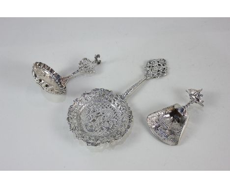 A Victorian silver sifter spoon, makers Sibray, Hall &amp; Co Ltd, London 1899, of ornate pierced scrolling form, an imported