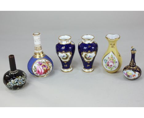 A collection of six late 19th / early 20th century miniature porcelain vases, to include a pair of Coalport vases painted wit