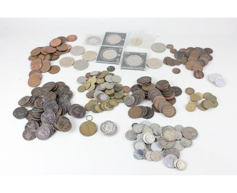 A collection of Victorian and later coins including pennies, commemorative crowns, threepenny pieces, a First World War Victo