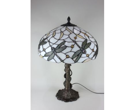 A Tiffany style table lamp with dragonfly decorated glass shade, 66cm high