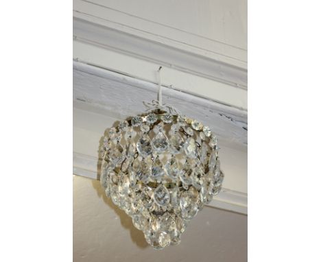 A brass four-tier chandelier light fitting with glass droplets, 24.5cm diameter