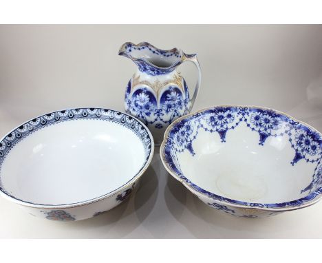 A W Adams &amp; Co Saxon ware porcelain toilet jug and basin with blue floral decoration on white ground, and gilt embellishm