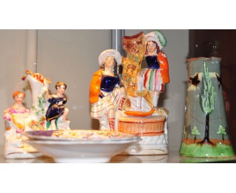 Two 19th Century Staffordshire flatback groups, taller H. 20cm, together with two late Spode saucers and a German glazed pott