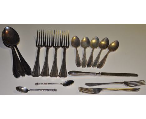 A collection of silver and plated flatware, including four Christofle forks, eight various Berndorf spoons a christening knif