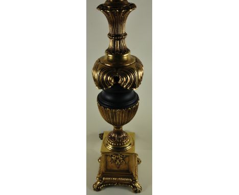 A large gilt metal and composite table lamp in the Classical style, H. 64cm