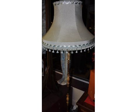 A gilt metal and onyx column floor lamp, 140cm high
