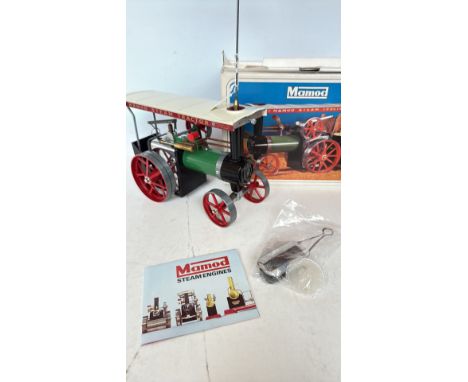 Mamod Steam Tractor comes with the original box, accessories, and manual. This is a live steam-powered model.
