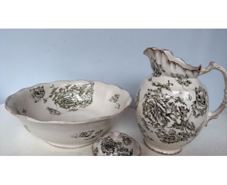 Late 19th-century Victorian ceramic wash set, comprising a pitcher, basin, and covered soap dish. It features a floral transf