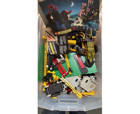 Vintage LEGO mixed lot, featuring Technic, Classic Castle, and Pirates themes. Includes instruction booklet and various parts