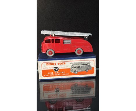 Dinky Toys 555 Fire Engine. Bright red diecast model made by Meccano Ltd. in England, includes original box.
