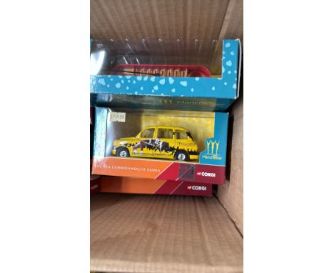 Corgi boxed diecast models, including a 2002 Manchester Commonwealth Games taxi and various vintage vehicles, all in original