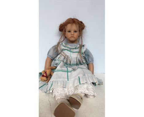 Bone Kruse Annette Himstedt doll with realistic features, hand-painted details, and original period-style clothing.
