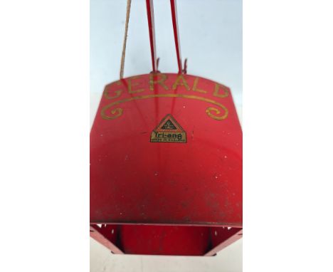 Tri-ang vintage tinplate crane from the mid-20th century. Features a classic red finish with hand-crank mechanism and pulley 