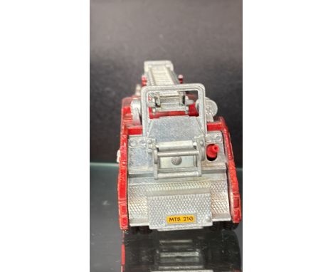 Vintage diecast model with extendable ladder, red and silver finish, and original box.
