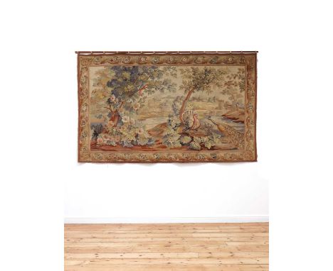A French Aubusson tapestry,19th century, depicting a peacock and a turkey in a verdant landscape,300cm wide183cm highProvenan