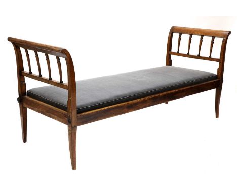 A Copenhagen mahogany bench, early 19th century, with curved rail ends and an upholstered drop-in seat, on tapering square le