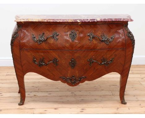 A French Louis XV-style serpentine commode,late 19th/early 20th century, of kingwood and tulipwood with inlaid marquetry, the