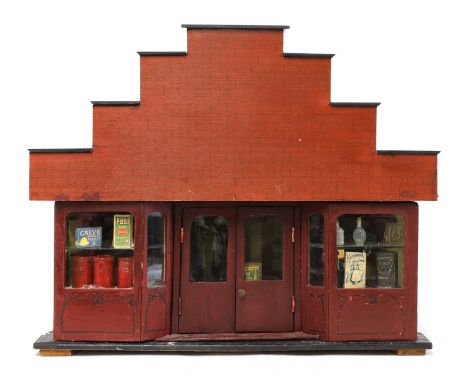 A Belgian diorama,early 20th century, depicting a Tabac, complete with miniature stock and shopkeeper,65cm wide30cm deep53cm 