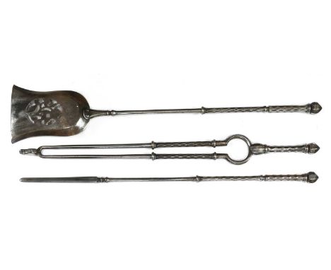 A set of three George III steel fire tools,each with a facet cut grip, the shovel with a pierced bowl, 75cm long (3)Condition