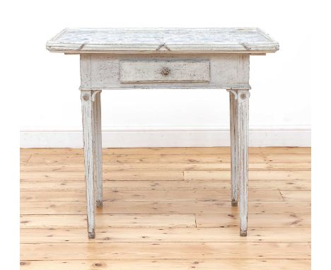 A Danish white-painted tile-top table,18th century, the rectangular top with a ribbon-tied edge, raised on tapering fluted su