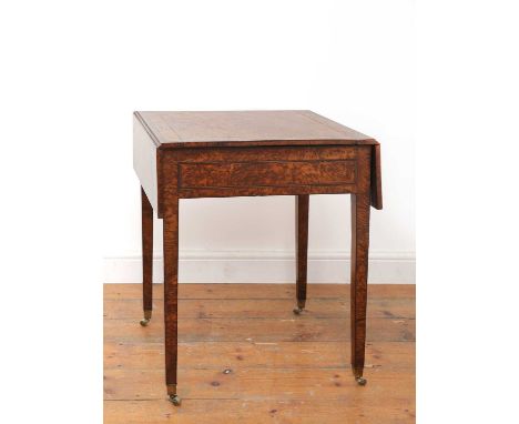 A George III burr yew Pembroke table,early 19th century, the top with strung detail, above a single frieze drawer, and raised