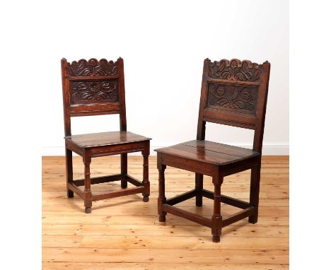 A pair of Charles II oak backstools,c.1670 and later, South Lancashire/North Cheshire, each of elegant slender form, the arch