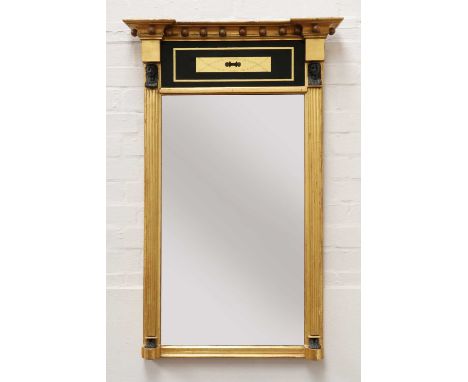 A Regency Egyptian Revival giltwood pier mirror,the inverted breakfront pediment above a verre églomisé glass frieze and rect