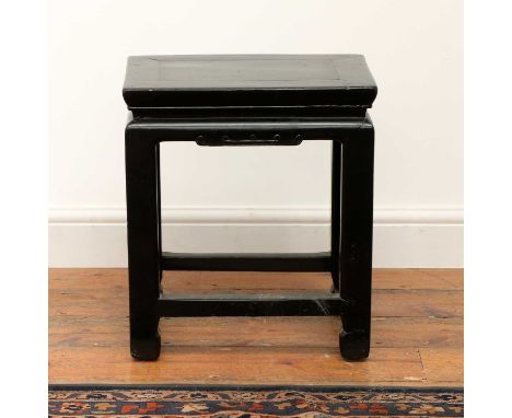 A Chinese black lacquer stool,19th century, with a panel inset top and shaped frieze,42cm wide29cm deep48cm highProvenance: F