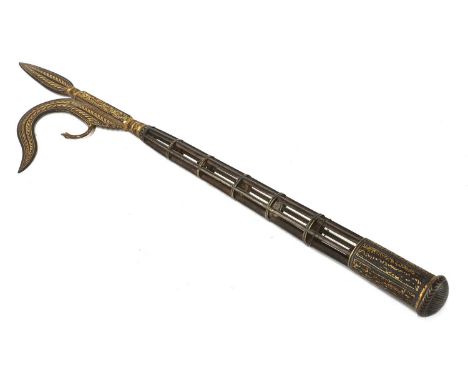An Indian ironwork elephant goad or ankus, inlaid with gold, the openwork shaft with small bells,58.5cm longProvenance: The c