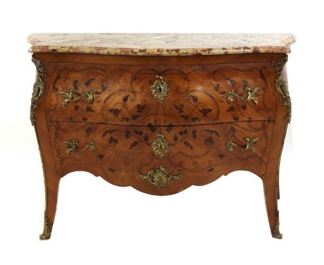 A French Louis XV kingwood, marquetry-inlaid and ormolu-mounted commode,of serpentine outline, the brèche d'Alep marble top a