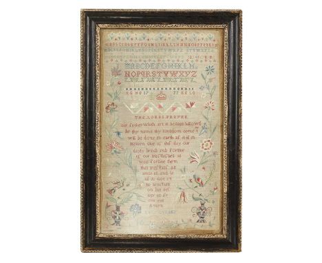 A Norfolk sampler,early 18th century, stitched with four alphabets, the Lord's Prayer, two colourful vases of flowers with bi