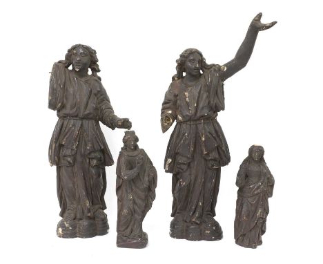 A pair of early carved wooden angels,with arms raised,50cm high,together with two smaller figures,24cm high (4)Condition repo