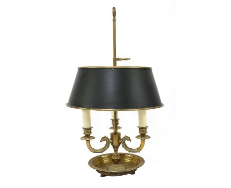 A French brass bouillotte lamp,20th century, with an adjustable toleware shade, 64cm highProvenance: Farm House, Farm Street,