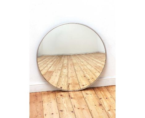 A convex wall mirror, 20th century, with a slender polished metal frame,86cm diameterCondition report: Light cosmetic wear to