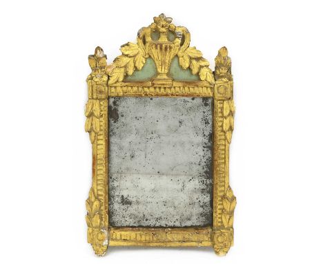 A painted and gilt wall mirror, 18th century, with gesso moulded urn and swags over a fluted border, 40 x 61cmProvenance: Pur