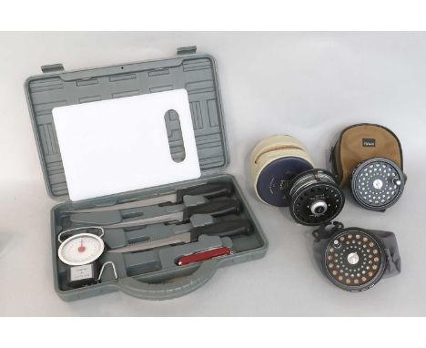 A Hardy Ultralight Disc Salmon Reel  with two spare spools. A set of scales and a box of fish knives. (5)