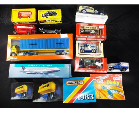 Tekno, Budgie and Others - A mixed collection of boxed diecast, plastic models in various scales, and ephemera. Lot consists 