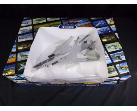 Franklin Mint Armour Collection - No.B11E210  A boxed diecast 1:48 scale F14 TOMCAT - PUKIN DOGS. The model appears to be in 