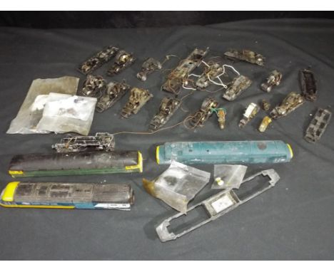 Hornby, Lima &amp; other - Twelve OO gauge motors, predominantly with bogies and Four bodies. Items in Playworn Condition.   