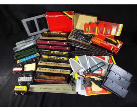 Hornby, Lima and Others - A collection of OO Gauge rolling stock, track, scenic buildings and accessories. Lot includes 9 OO 
